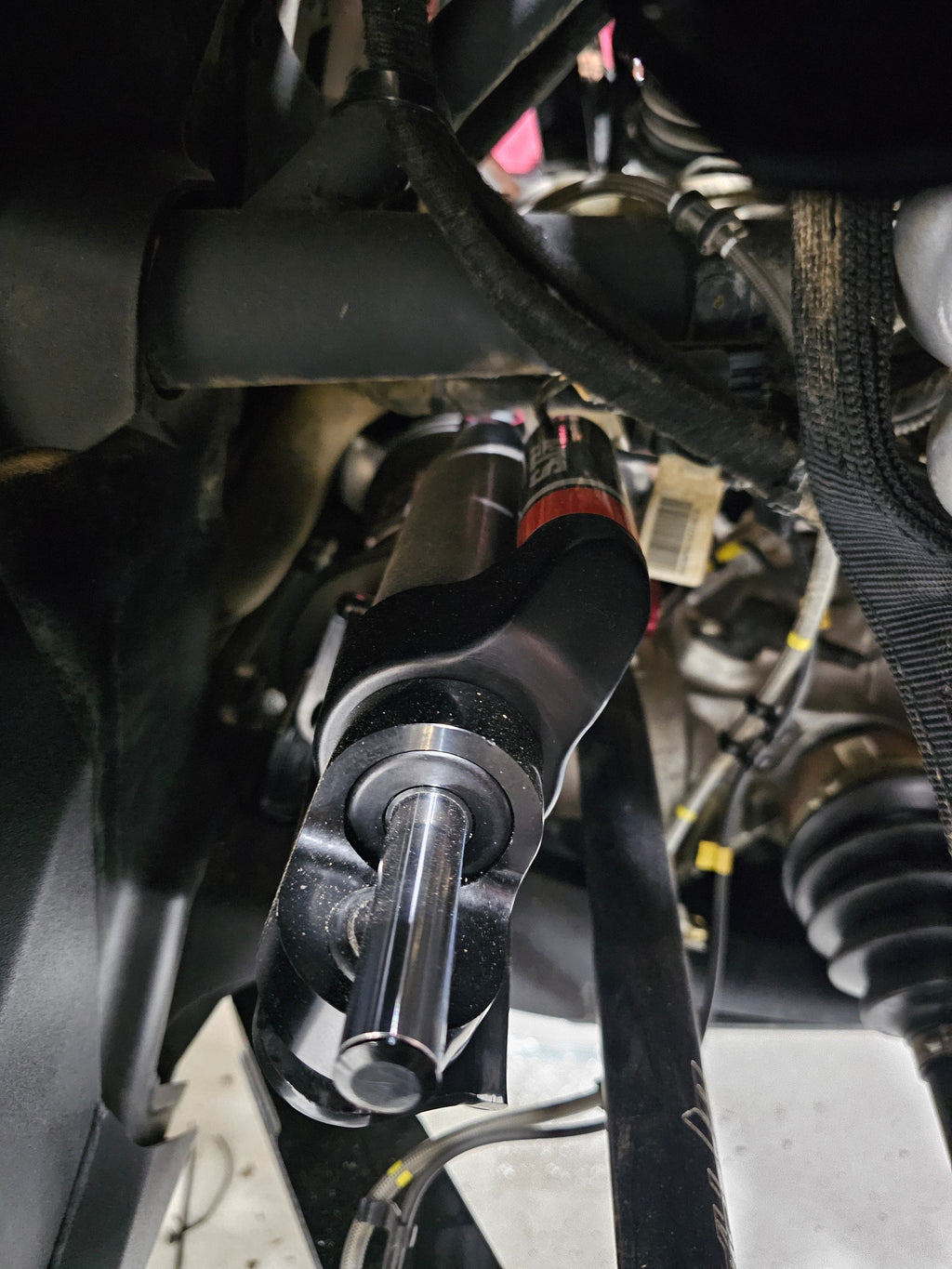 Maverick R Steering Dampener Assembly